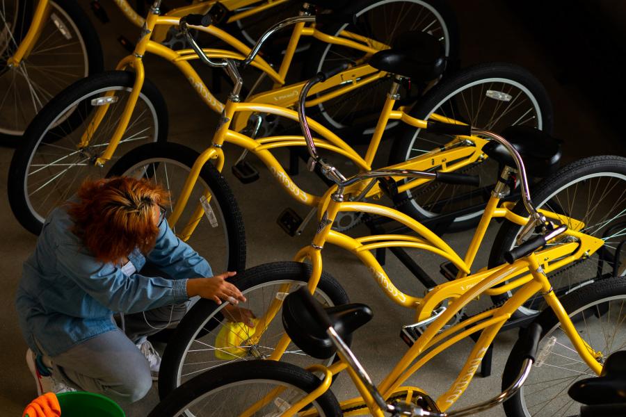 Student maintaining Sinnissippi Cruisers bikes, our bike share program.