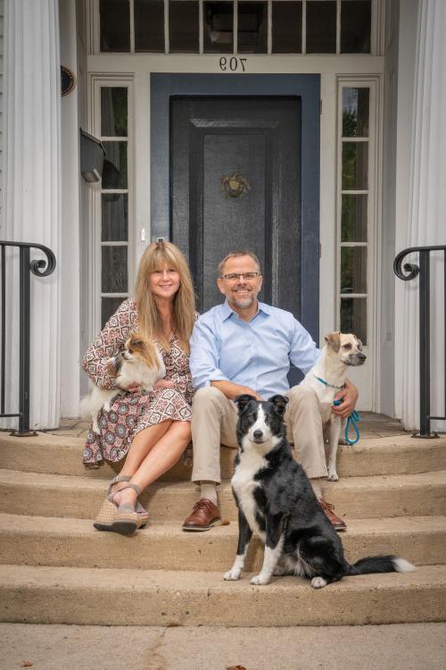 President Eric Bonyton, Julie, and the family pups.